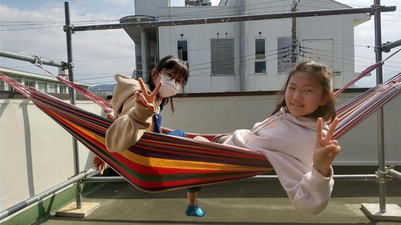 איסה 海辺のゲストハウスーぽかぽか村ー מראה חיצוני תמונה